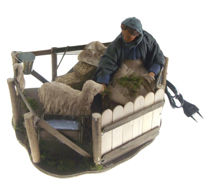 donna con pecore in movimento cm 24 terracotta