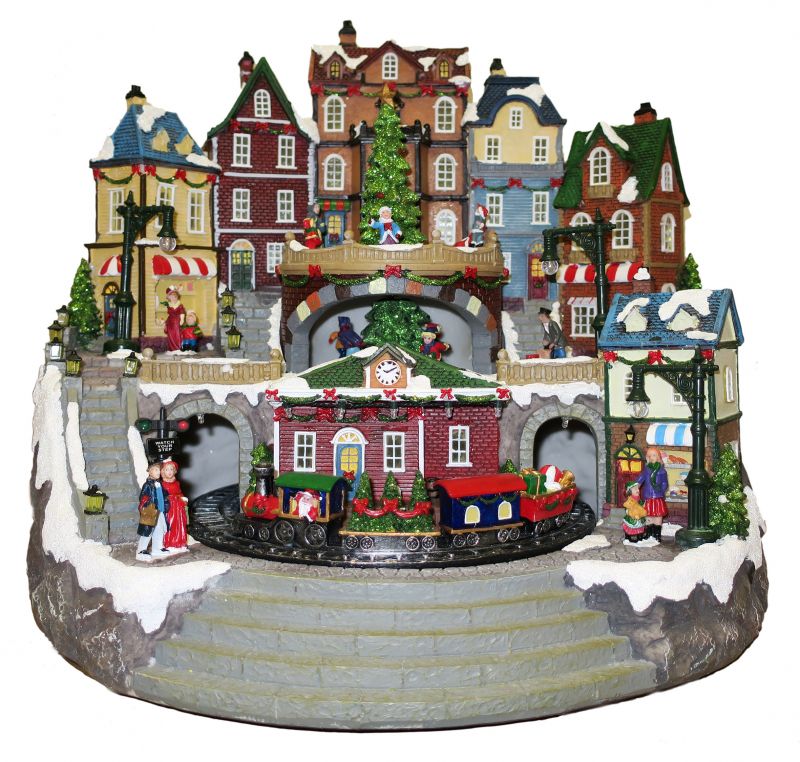 villaggio natalizio con treno e negozi, movimento, luci, musica (42 x 38,5 x 35 cm)
