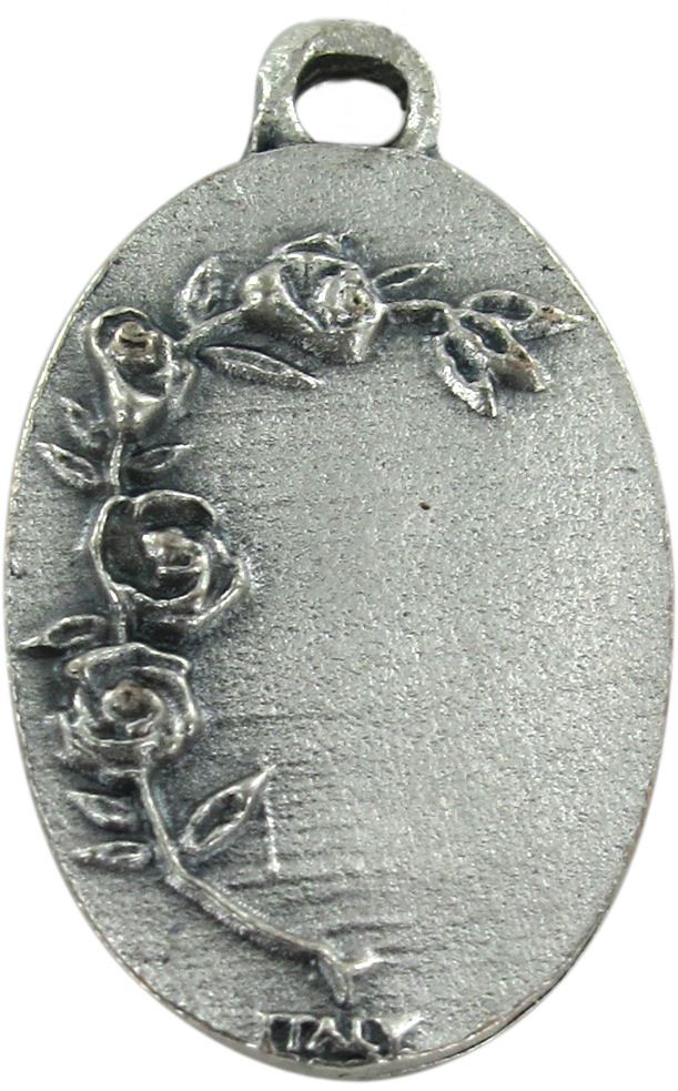 medaglia san giuseppe in metallo ossidato misura 2,5 x 1,5 cm.