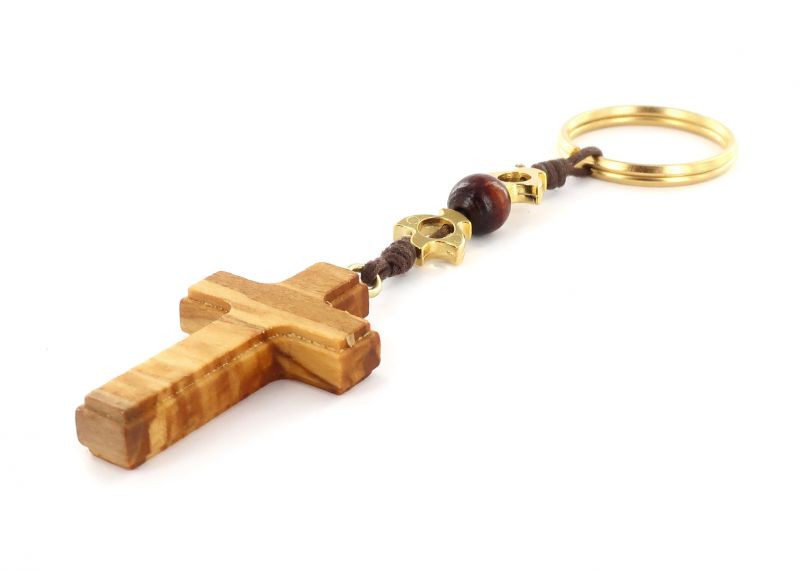 portachiavi croce legno ulivo con colombe in metallo dorato