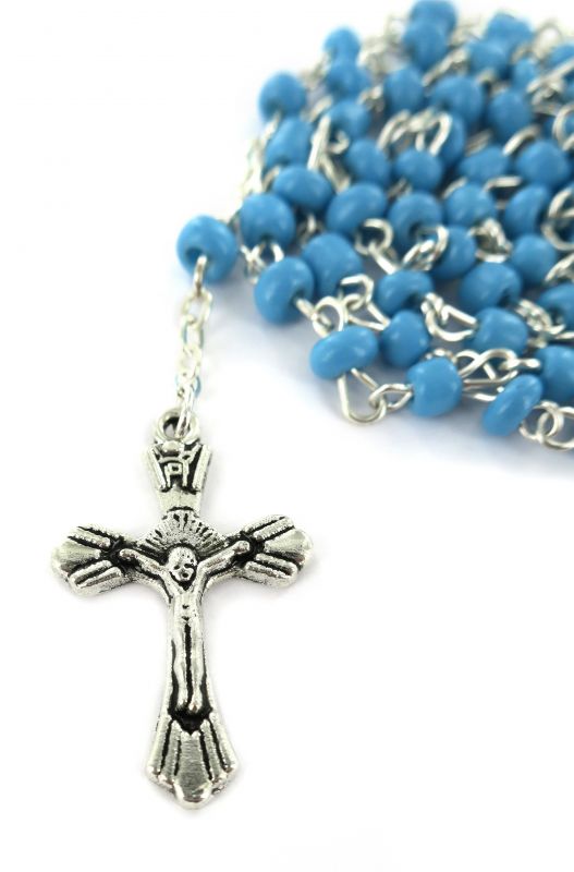 rosario perlina azzurra mm.4 con confezione trasparente a forma di caramella