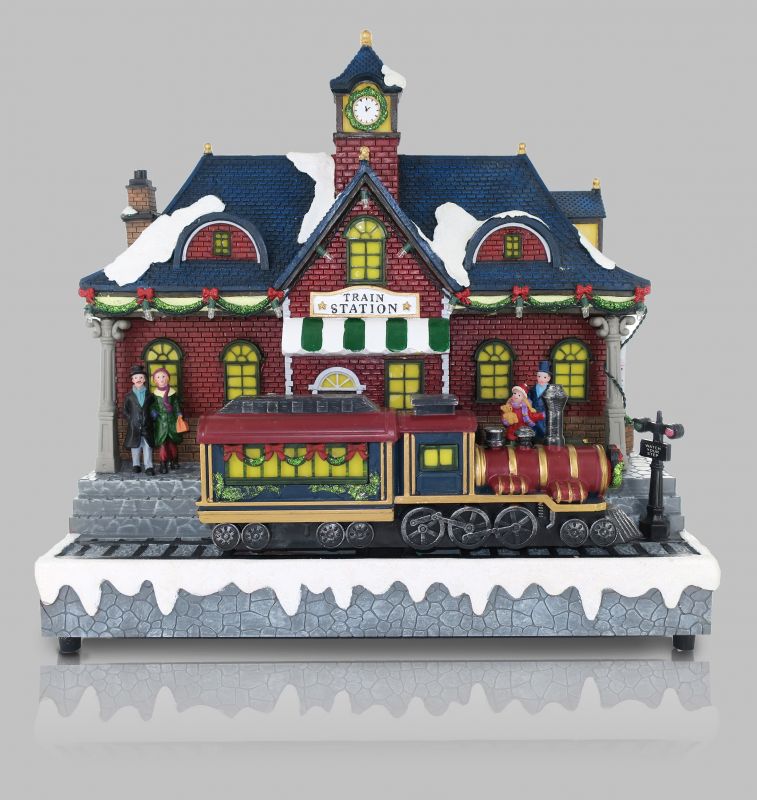 villaggio natalizio con stazione e treno in movimento, luci, musica (32 x 32 x 15,5 cm)