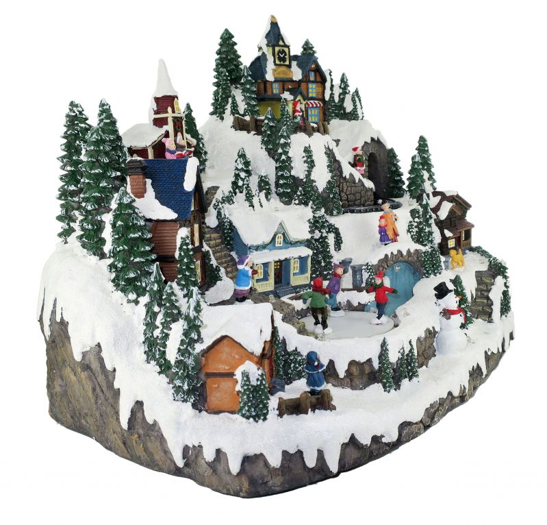 villaggio natalizio su montagna con treno e pista di pattinaggio in movimento, luci, musica (31 x 37,5 x 28,5 cm)
