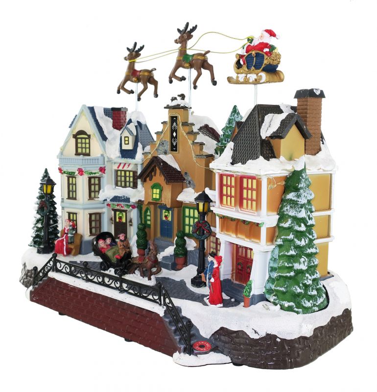 villaggio natalizio con babbo natale e renne in movimento, luci, musica (39 x 31 x 19 cm)