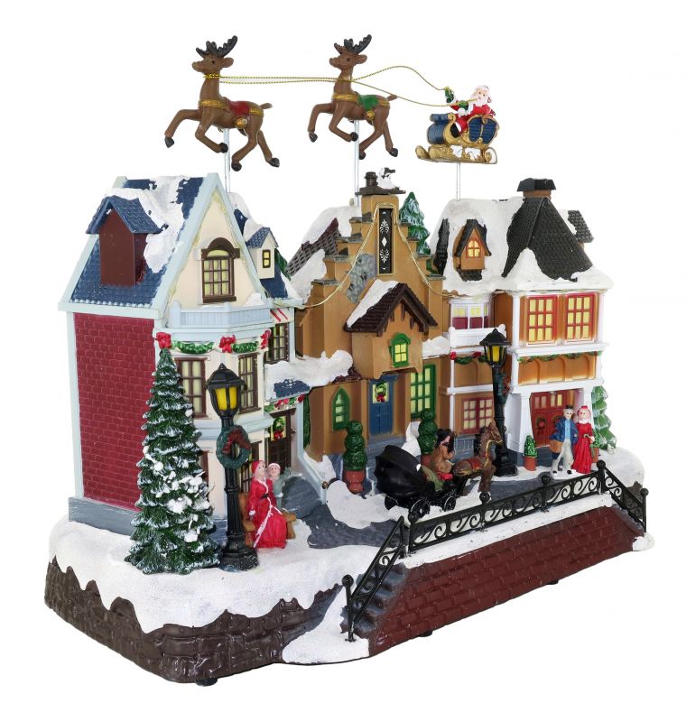villaggio natalizio con babbo natale e renne in movimento, luci, musica (39 x 31 x 19 cm)
