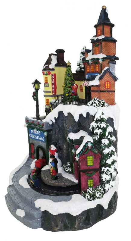 villaggio natalizio con negozi e treno in movimento, luci, musica (21 x 35 x 22 cm)