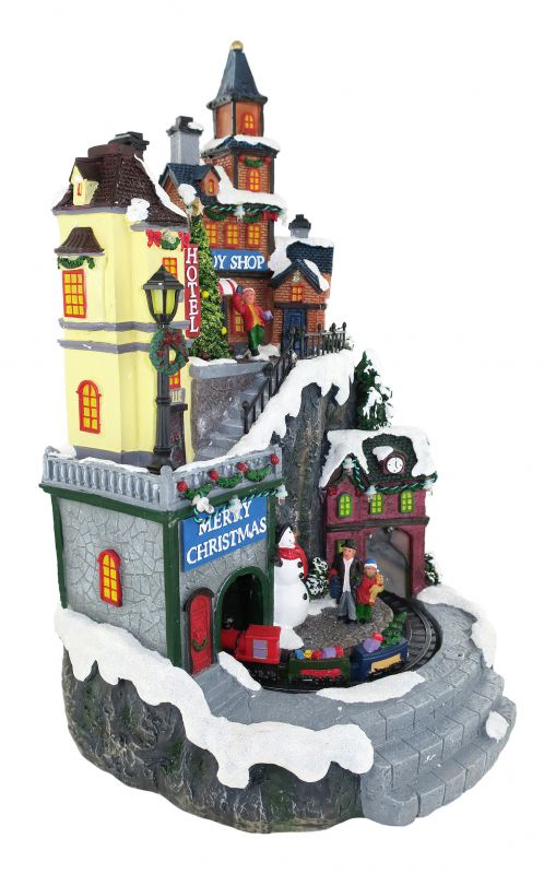 villaggio natalizio con negozi e treno in movimento, luci, musica (21 x 35 x 22 cm)