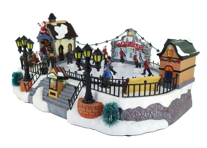 villaggio natalizio con pista di pattinaggio, movimento, luci, musica (39 x 18,5 x 28 cm)