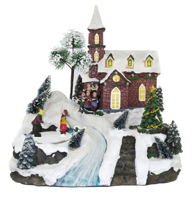 villaggio natalizio con chiesa e ruscello, movimento, luci, musica (25 x 27,5 x 20 cm)