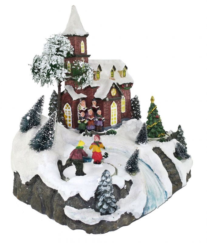 villaggio natalizio con chiesa e ruscello, movimento, luci, musica (25 x 27,5 x 20 cm)