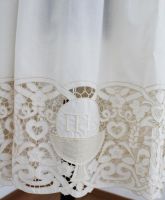 COTTA IN LANA CON RICAMO INTAGLIO A MANO